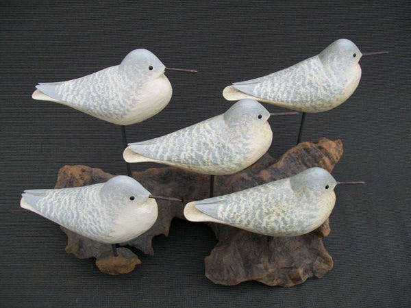 Five Peeps raised wings on driftwood stand