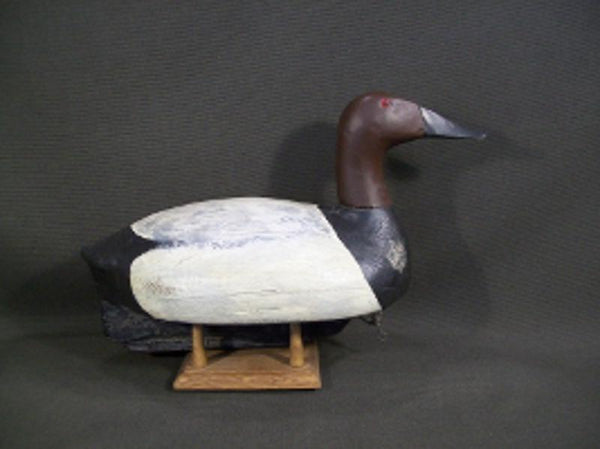 One Arm Kelley Canvasback with weighted Keel.  Nice heavy bird.  Measures 15-1/2" long, 6" wide, and 9-1/2" tall