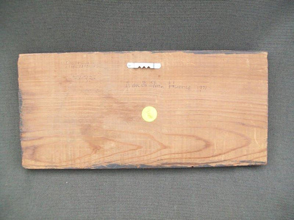 Carved Pintail Heads on Wood