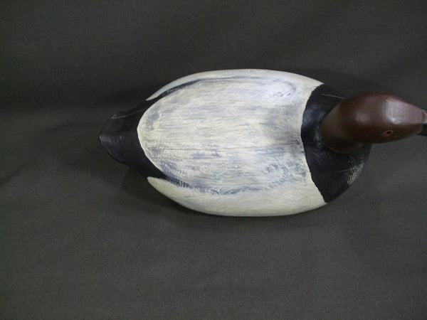 One Arm Kelley Canvasback with weighted Keel.  Nice heavy bird.  Measures 15-1/2" long, 6" wide, and 9-1/2" tall