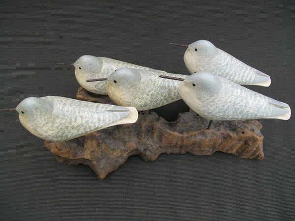 Five Peeps raised wings on driftwood stand