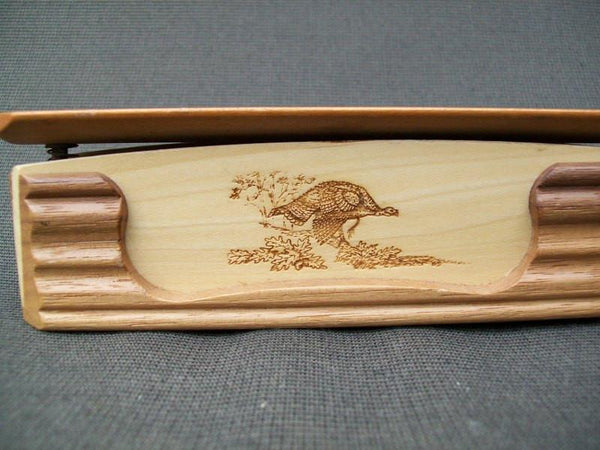 Turkey call - decorative with carvings on side and scenery on top