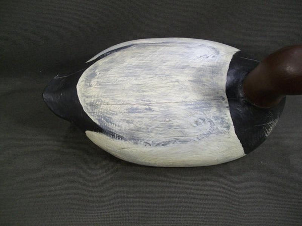 One Arm Kelley Canvasback with weighted Keel.  Nice heavy bird.  Measures 15-1/2" long, 6" wide, and 9-1/2" tall