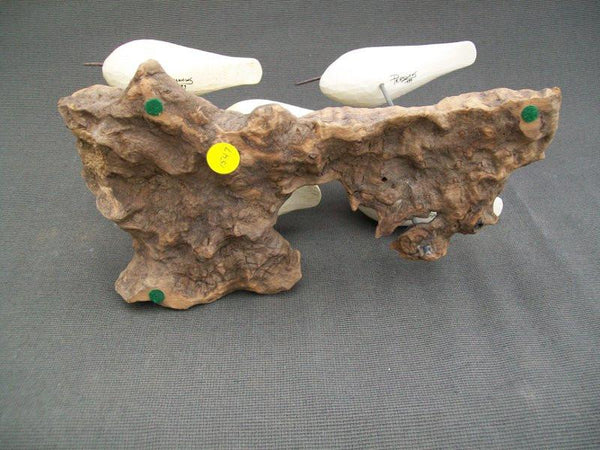 Five Peeps raised wings on driftwood stand