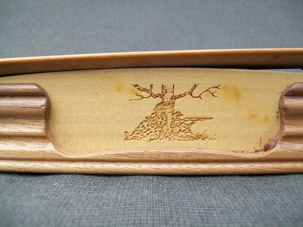 Turkey call - decorative with carvings on side and scenery on top