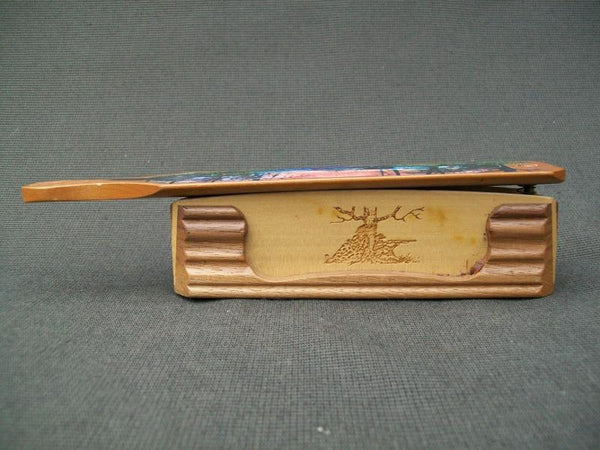 Turkey call - decorative with carvings on side and scenery on top