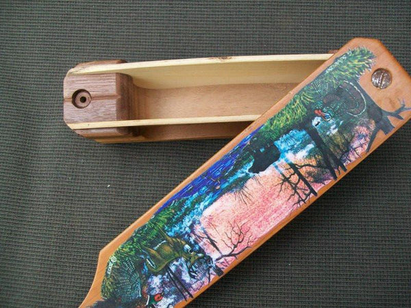 Turkey call - decorative with carvings on side and scenery on top